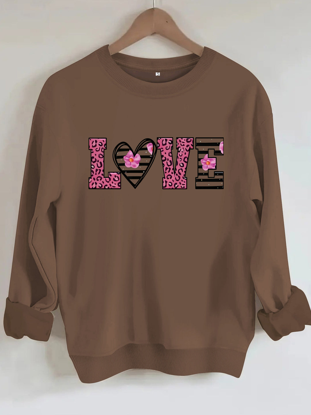 Kvinders sweatshirt med moderne leopard hjerte design og behagelig pasform Stilla