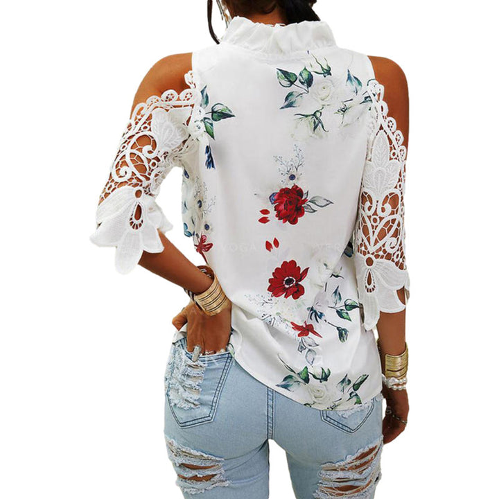 Damebluse med cut-out-ærmer og spetsdetaljer Stilla