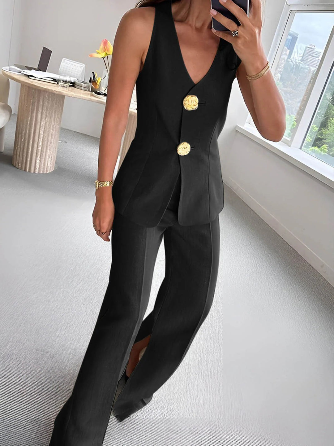 Dame elegant jumpsuit med front knaplukning og bred ben Skovae