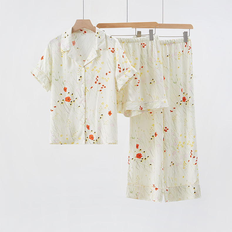 Dame Pyjamasæt med delikat blomstermønster og afslappet kortærmet top Stilla