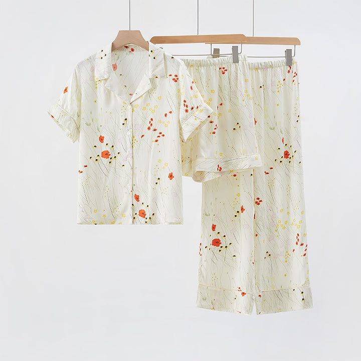 Dame Pyjamasæt med delikat blomstermønster og afslappet kortærmet top Stilla