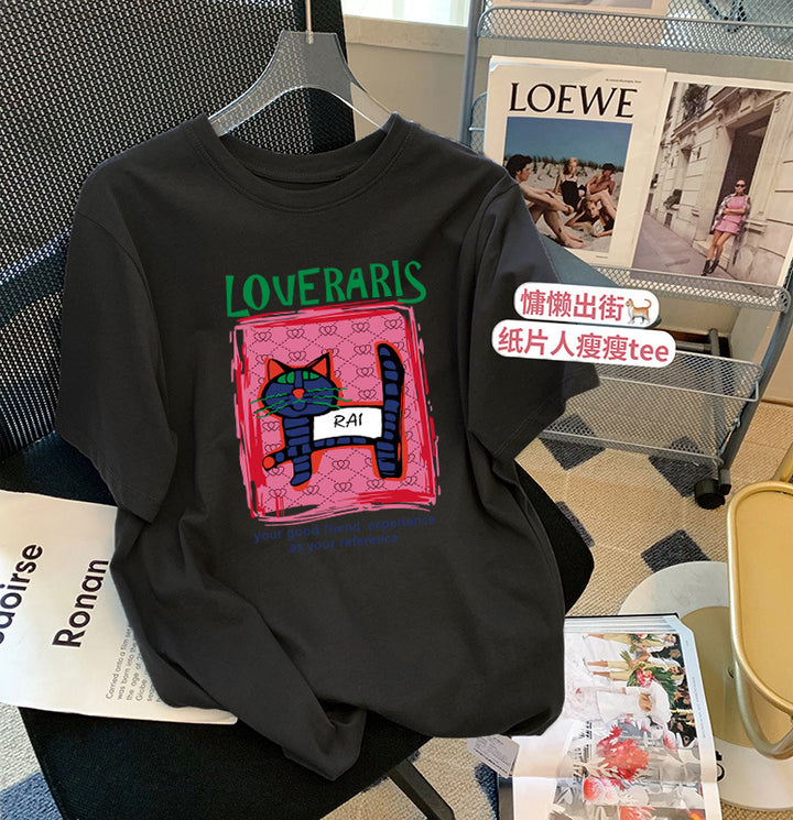 Dame T-shirt med kreativ kattemotiv og moderne tryk Stilla