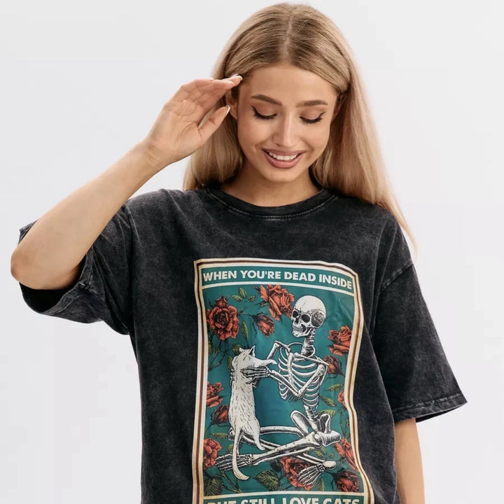 Dame T-shirt med kreativt skeletdesign og legende dyremotiv Stilla