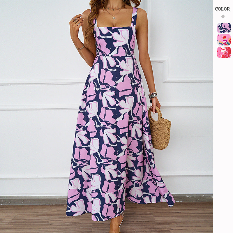 Dame maxi kjole med moderne blomsterdesign og flatterende silhuet Skovae