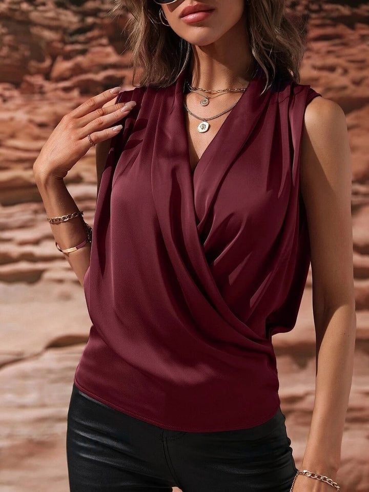 Dame Elegant top med omslagseffekt og drapering Skovae