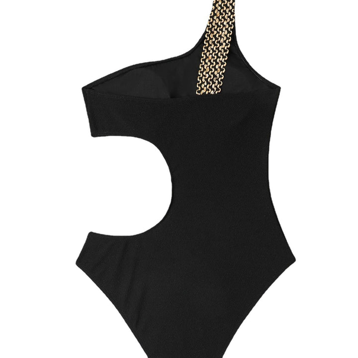 Dame enhedsbadedragt med asymmetrisk design og trendy cut-out-detaljer Stilla