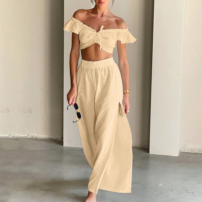 Dame sæt bestående af skulderfri crop-top og højt skåret maxiskørt Stilla