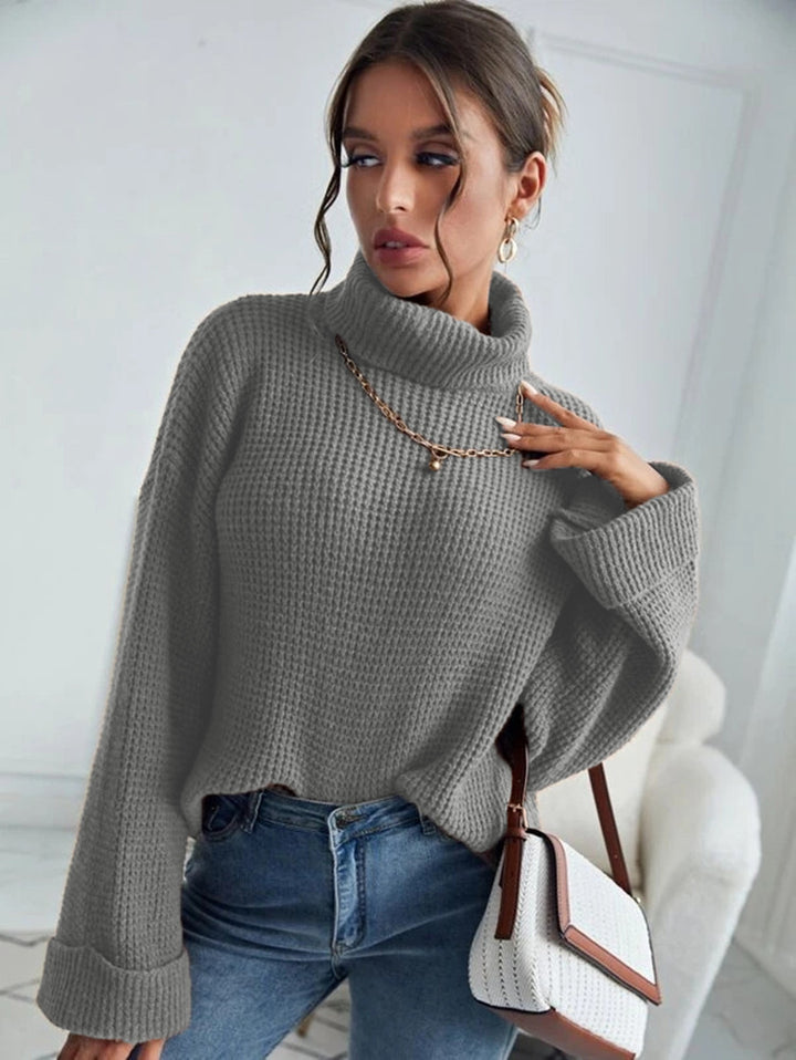 Kvinders strikkede sweater med høj krave og teksturerede ærmer Stilla