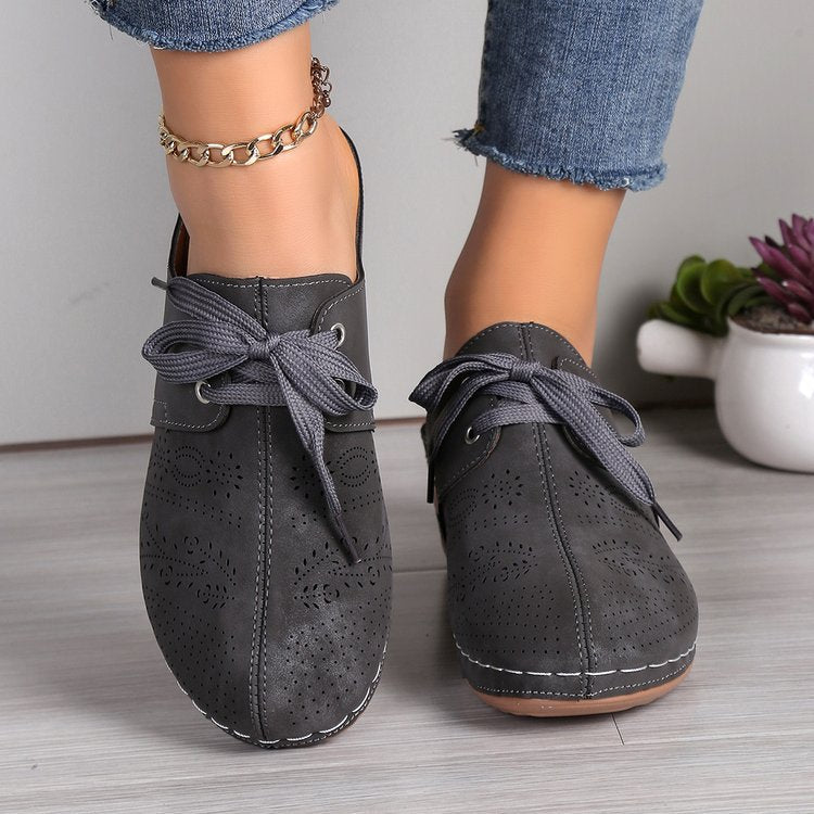 Dame åndbare sneakers med nostalgisk design og fine perforeringer Stilla