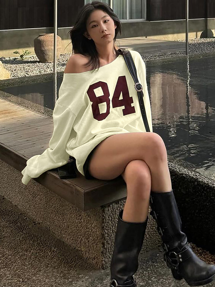 Dame Oversized Sweatshirt med stilfuld Cut-Out-design og sporty tryk Stilla