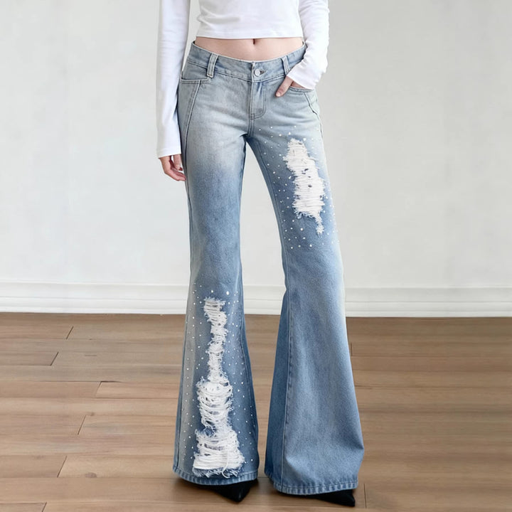 Dame Schlagjeans med moderigtige destroyed-detaljer og komfortabel pasform Skovae