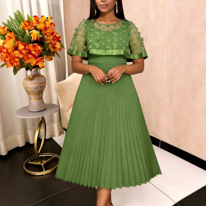Dame elegant aftenkjole med plisseret skirt og gennemsigtige pufærmer Skovae