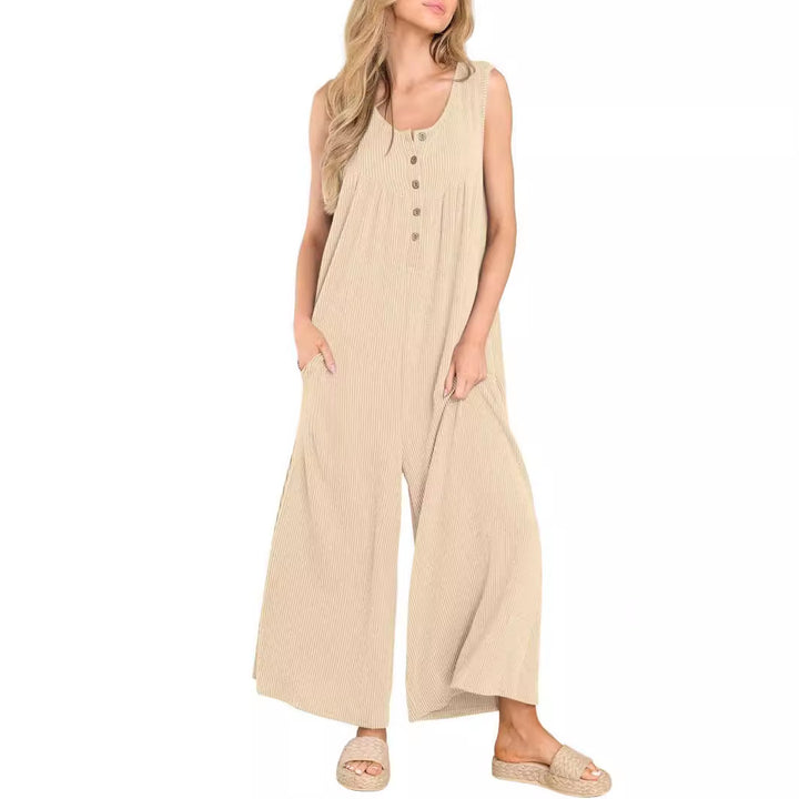 Dame afslappet jumpsuit med knapdetaljer og bredt skåret ben Stilla