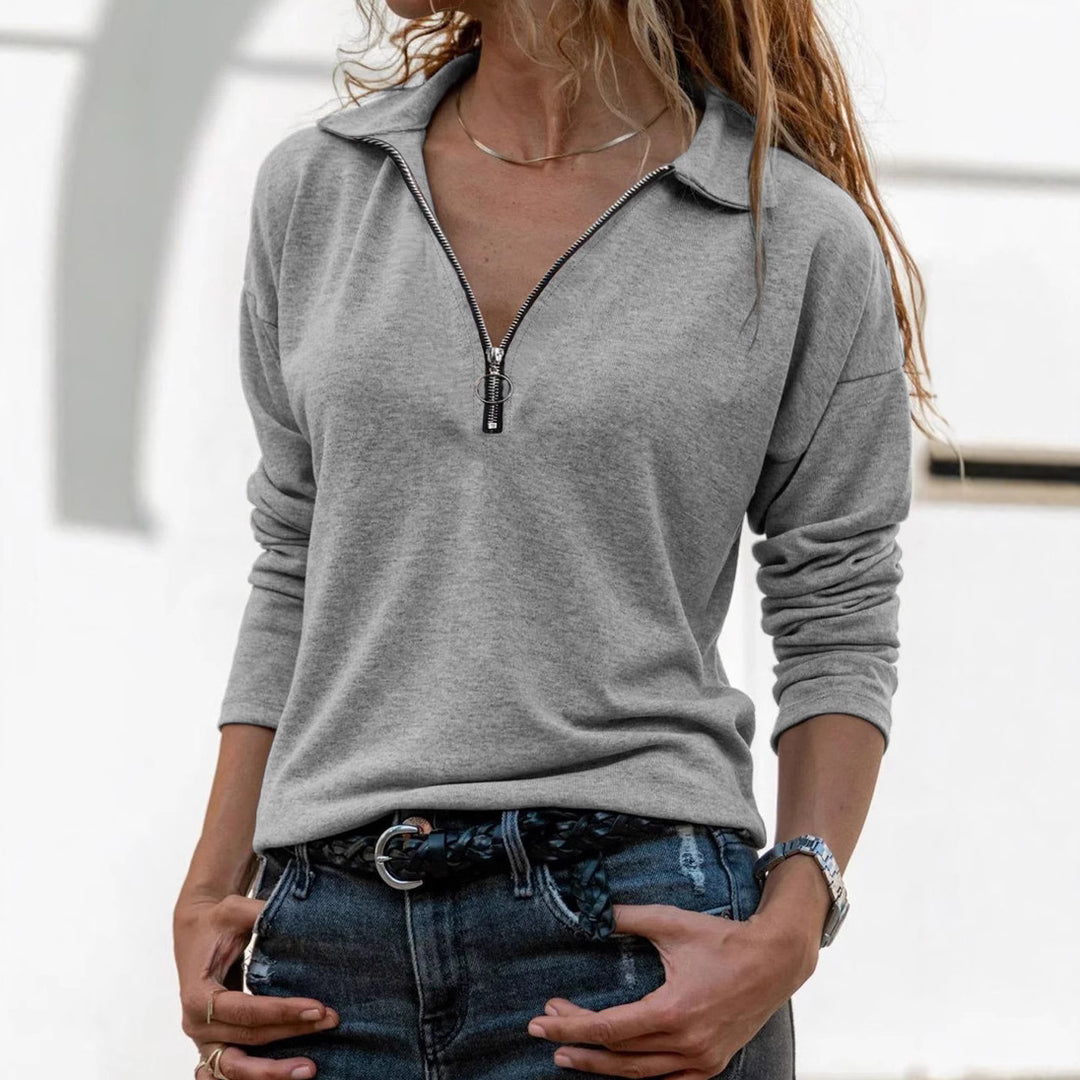 Dame sporty sweatshirt med moderne ståkrave og half-zip-design Stilla