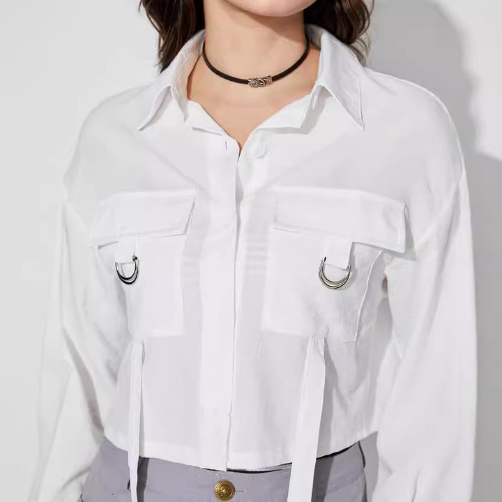 Kvinders cropped skjorte bluse med praktiske lommer og moderne detaljer Stilla