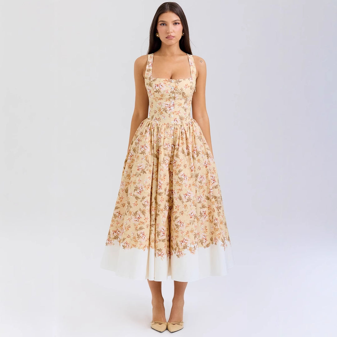 Dame Midikjole i vintage-stil med blomstertryk og svajende skørt Stilla
