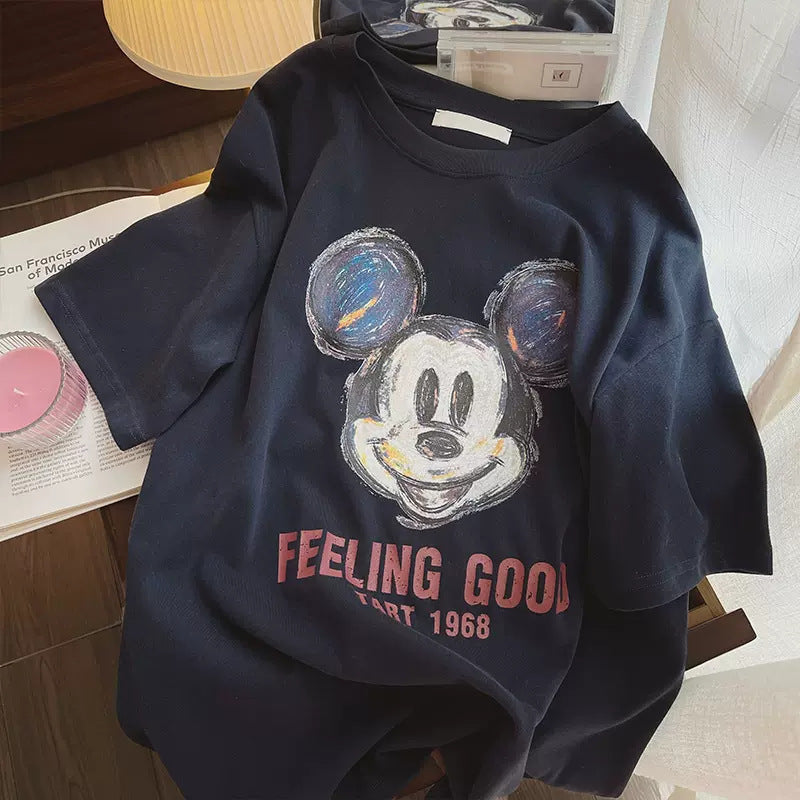 Dame T-shirt med kreativt Mickey Mouse design og afslappet snit Stilla
