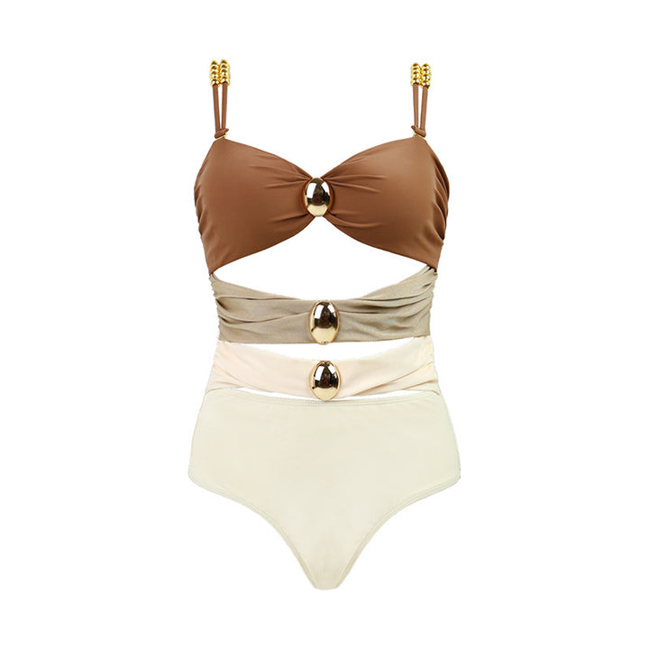 Dame one-piece badedragt med stilfuld omslag design og gyldne accenter Skovae