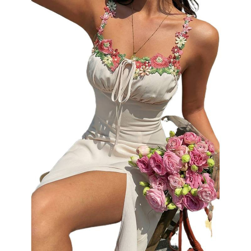 Dame maxikjole med blomsterdetalje og justerbar udskæring Skovae
