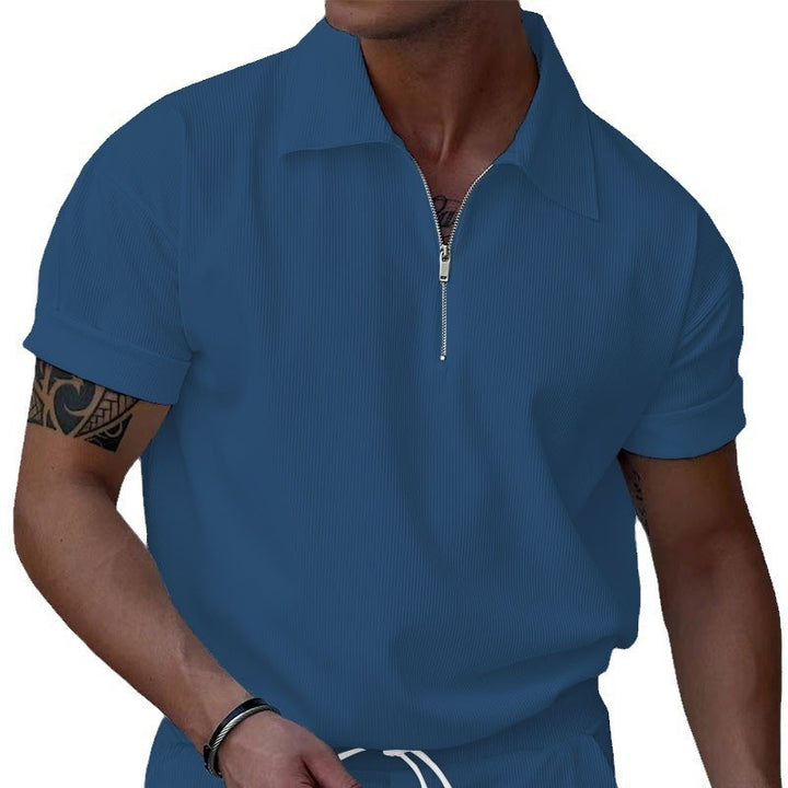 Herrer polo med kort lynlås og struktureret design Stilla