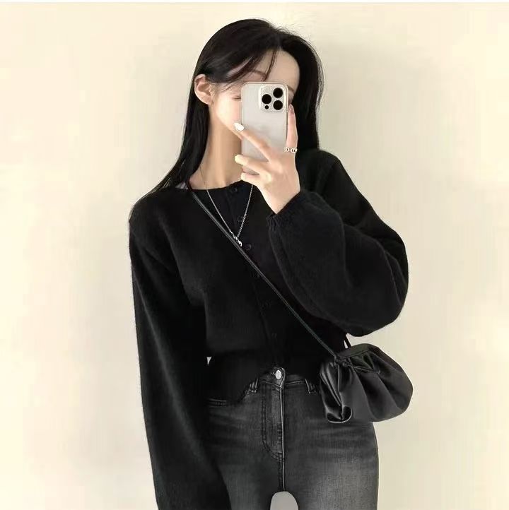 Kvinderne cropped cardigan med knaplukning og oversized ærmer Stilla