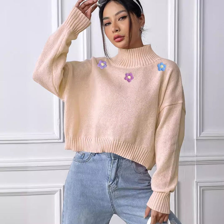 Dame elegant strikpullover med blomstret design og høj krave Stilla