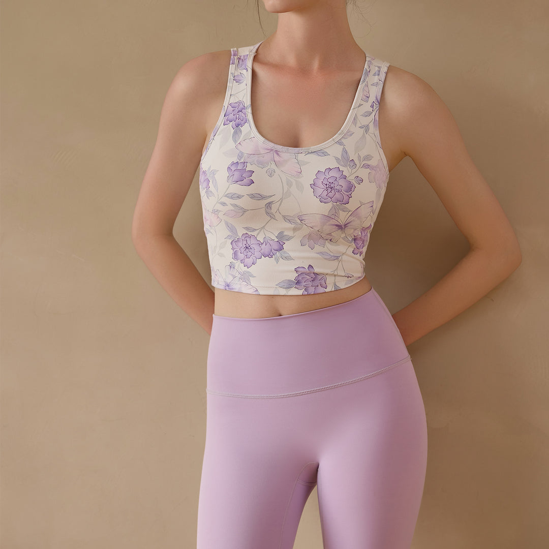 Dame Sporty Crop-Top med farverigt sommerfuglemønster og ergonomisk pasform Stilla