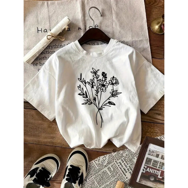 Dame T-shirt med kreativt blomstertryk og afslappet pasform Stilla