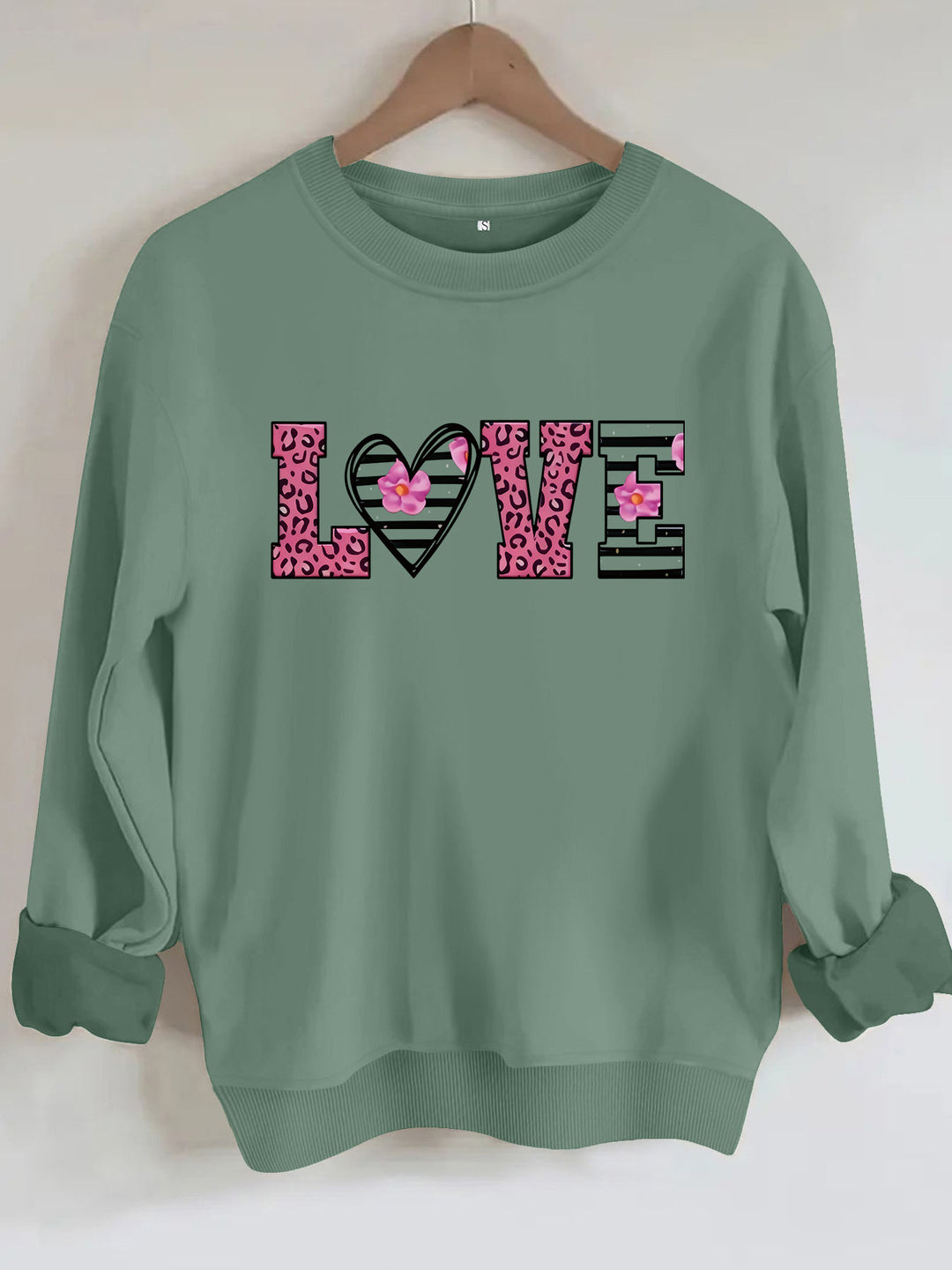 Kvinders sweatshirt med moderne leopard hjerte design og behagelig pasform Stilla