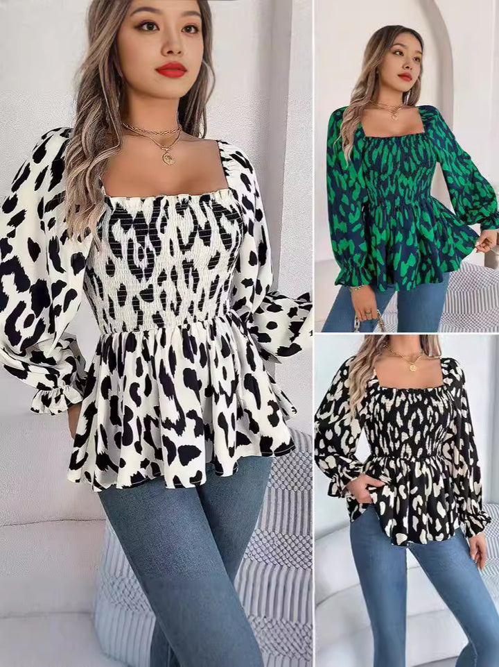 Dame bomuldsbluse med flæser og puffærmer Stilla