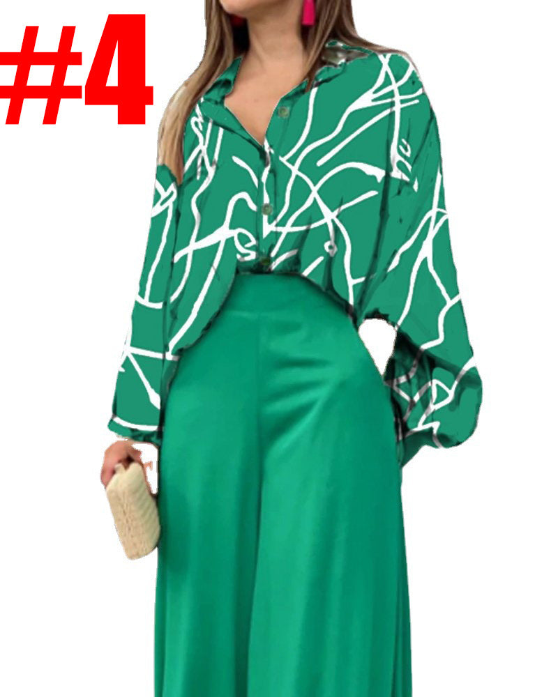 Dame fritidsbluse med farverig marmortryk og loose fit Stilla