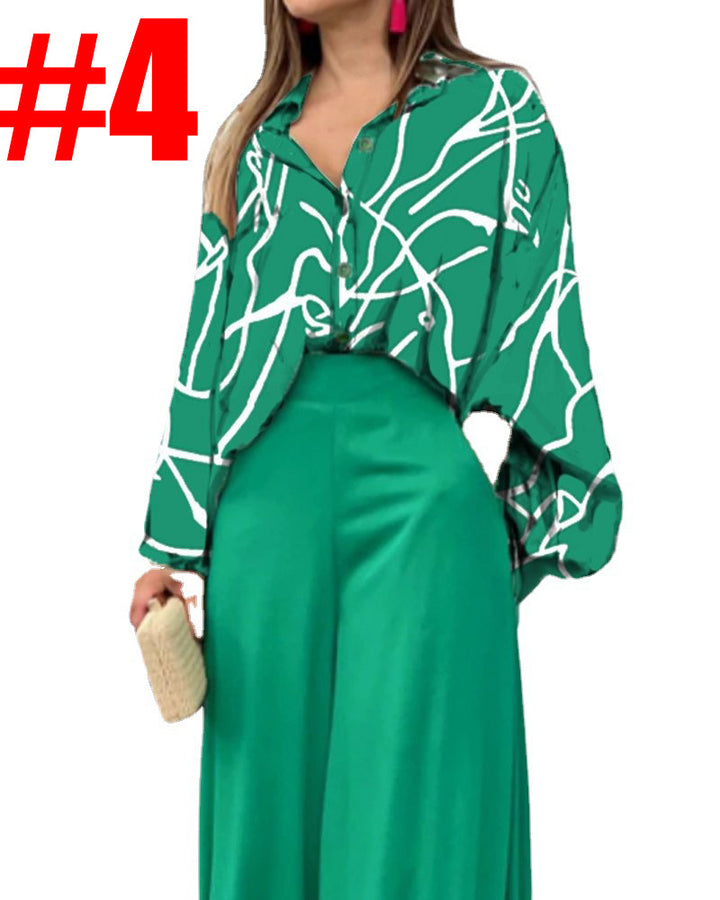 Dame fritidsbluse med farverig marmortryk og loose fit Stilla