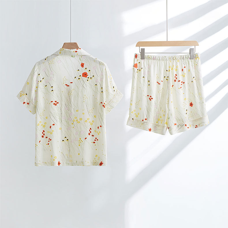 Dame Pyjamasæt med delikat blomstermønster og afslappet kortærmet top Stilla