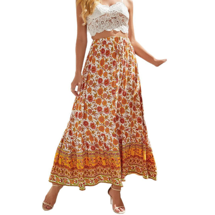 Dame Maxikjole med floral design og elastisk talje Stilla