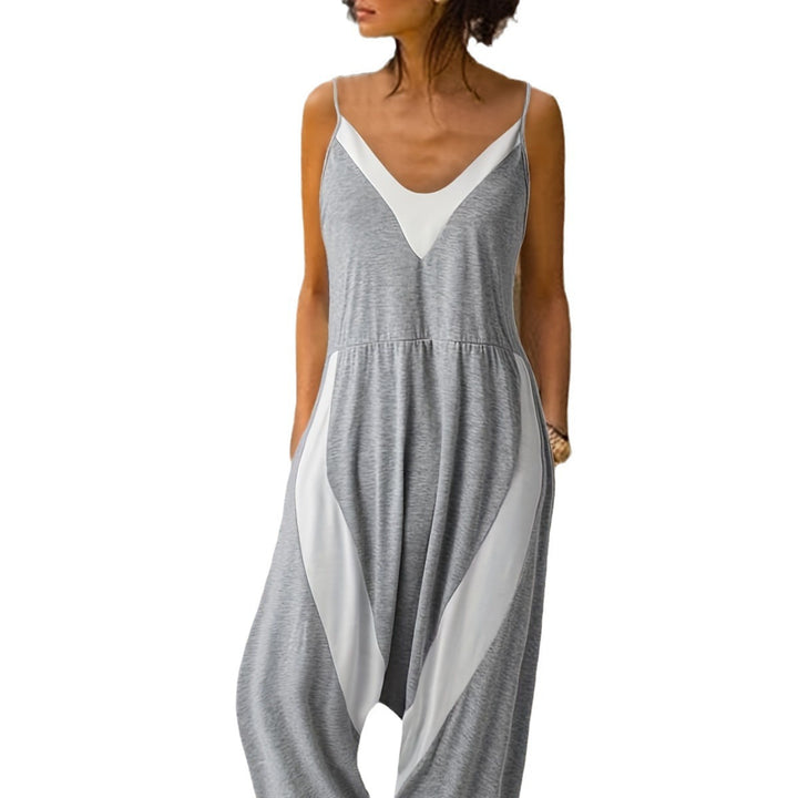 Dame løs jumpsuit med dyb V-udskæring og sidelommer Stilla