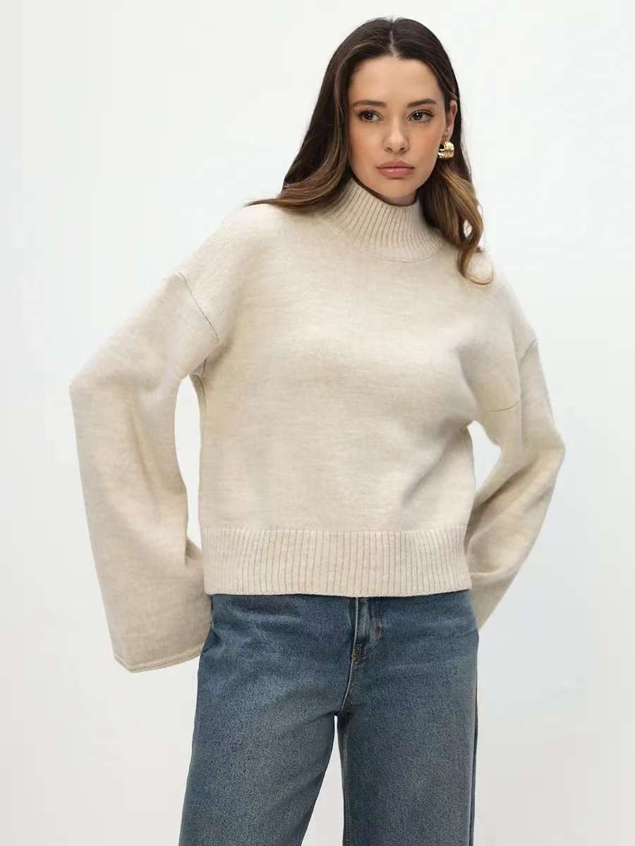 Kvindernes chunky strikket sweater med stående krave og voluminøse ærmer Stilla