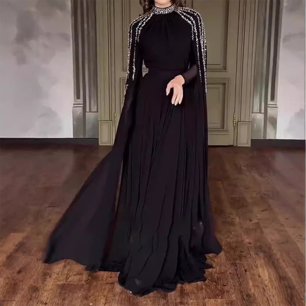 Dame Maxikjole med elegante, lange ærmer og detaljeret perleudsmykning Stilla