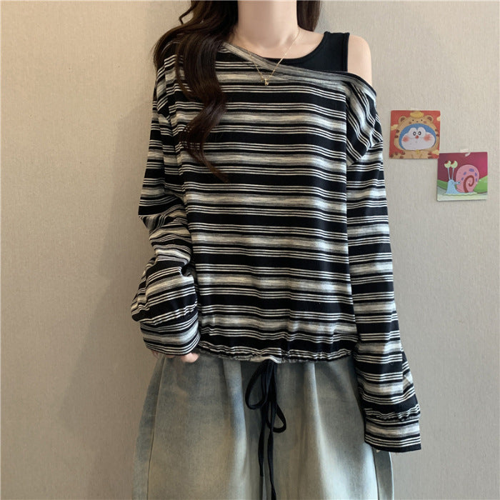 Kvinders afslappede skjorte med lange ærmer og off-shoulder design Stilla