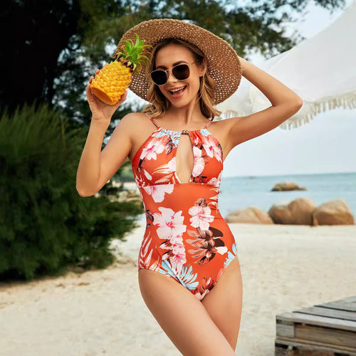 Dame one-piece badedragt med moderigtig nøgle-udskæring og florale accenter Stilla