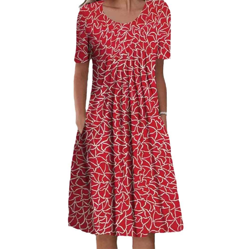 Dame fritidskjole med blomstret design og praktiske lommer Stiila