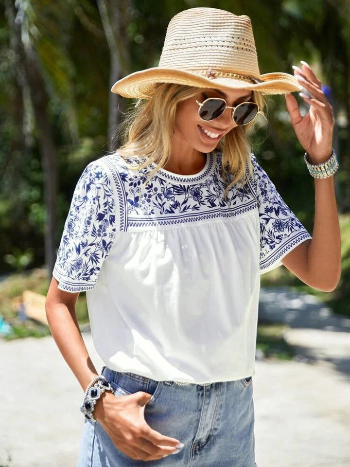 Damer stribet T-shirt med floralt broderi og afslappet pasform Stilla