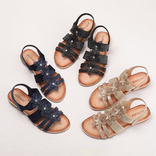 Dame sandaler med blomstret accent og justerbart remdesign Stilla