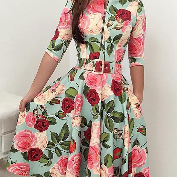 Kvindernes midikjole med blomsterprint og taljebælte Stilla