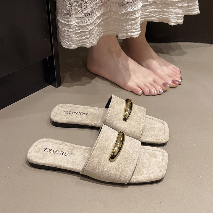 Dame clogs i elegant design med gyldne accenter og blød, skridsikker sål Stilla