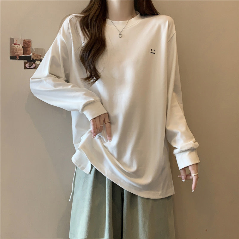 Dame Relaxed Fit Langærmet T-shirt med unikt grafisk detail Stilla