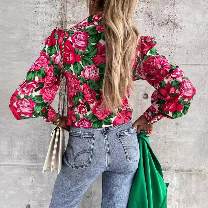 Damebluse med blomstret tryk og voluminøse ærmer Stilla