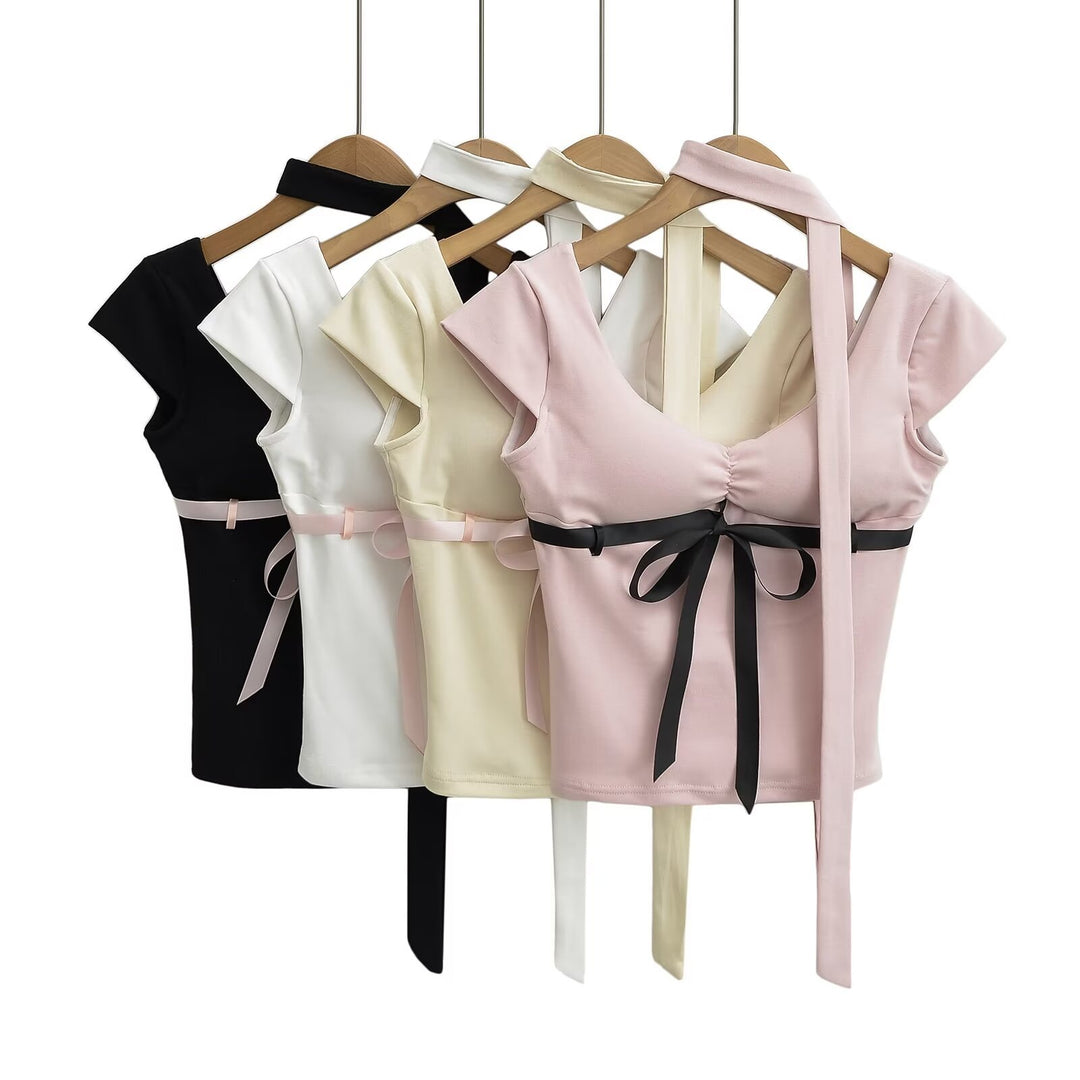 Dame Cut-out top med sødt båndaccent Stilla