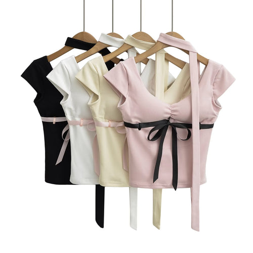 Dame Cut-out top med sødt båndaccent Stilla
