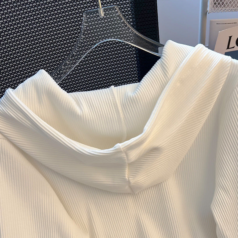 Dame hættebluse med innovativ ribdesign og knapliste Stilla