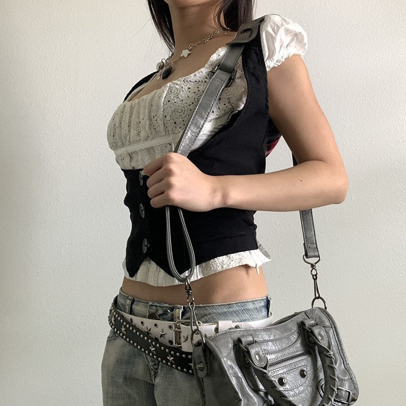 Dame Mode Crop Top med elegante knapdetaljer og tætsiddende snit Skovae